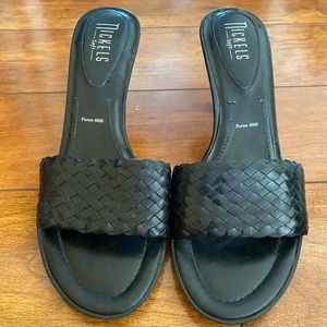 Black slip on pumps.